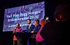 Paneldeltakere på scene foran storskjerm med Fair Play Bygg Norge-logo