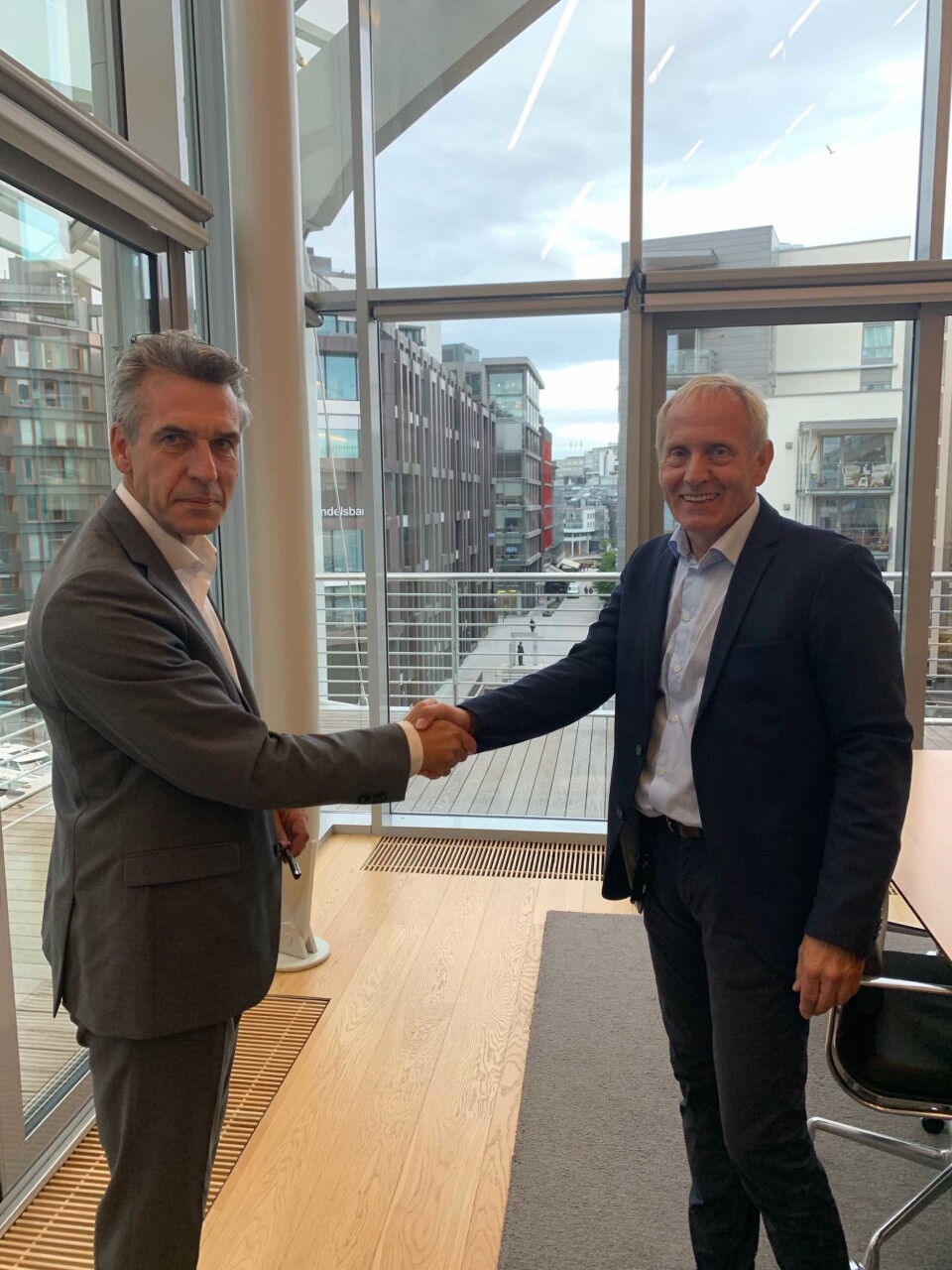 Adm.dir. i 4CastGroup/Prognosesenteret Bjørn M. Birkeland og adm.dir Stig W. Seljeseth i Ambita tror at oppkjøpet vil gi begge selskap et strategisk løft.