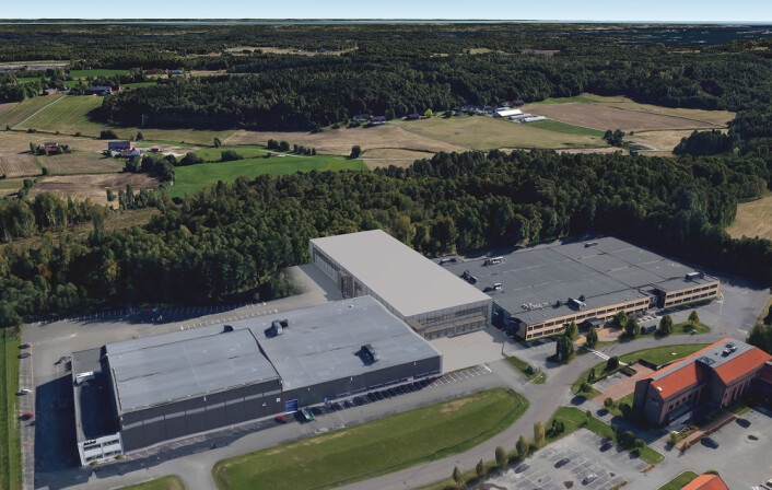 Bildet viser en grafikk for hvordan bygningen i midten vil koble sammen Kompletts to lagerbygg i Sandefjord og dermed effektivisere logistikken. Bildet viser en grafikk for hvordan bygningen i midten vil koble sammen Kompletts to lagerbygg i Sandefjord og dermed effektivisere logistikken.